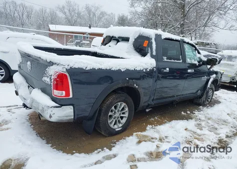 2015 Ram 1500 Laramie из США, поврежденный, VIN 1C6RR7NTXFS513771